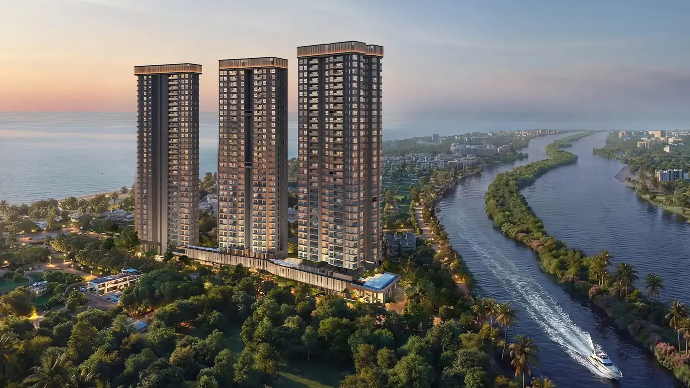Ocean Cliffs towers at dusk with the river and coastline